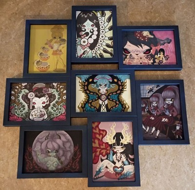 Junko Mizuno art in multi image displaying frame -holds 8 pictures 5x7''