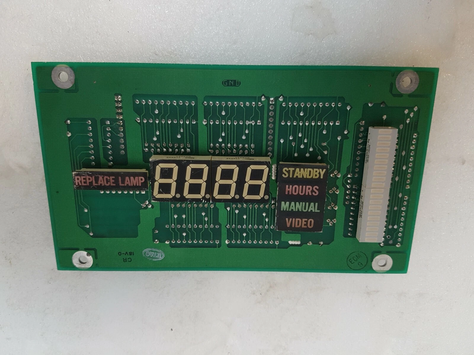 M17102B display side: 4-digit LED display, bar graph, Replace Lamp, Standby, Hours, Manual, Video