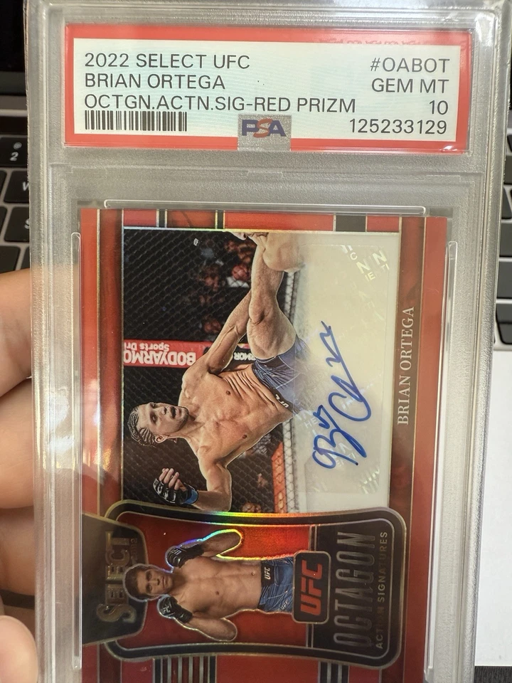 2022 Panini Select UFC - Octagon Action Brian Ortega Red Prizm /99 (AU) - Image 2 of 3