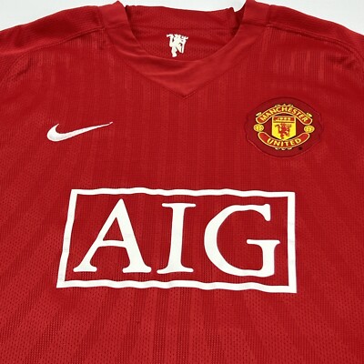 NIKE Dry Fit Large Red AIG Manchester United Jersey Shirt Stark
