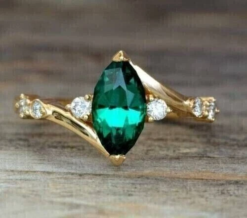 Marquise cut 2024 emerald engagement rings