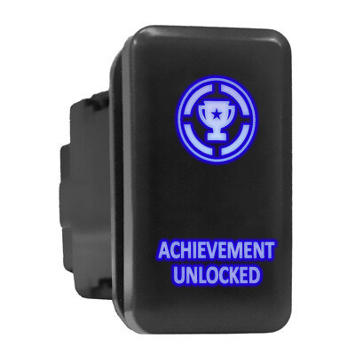 ACHIEVEMENT UNLOCKED Blue Backlit Tall Push Button 1.54''x 0.83'' (Fit: Toyota)