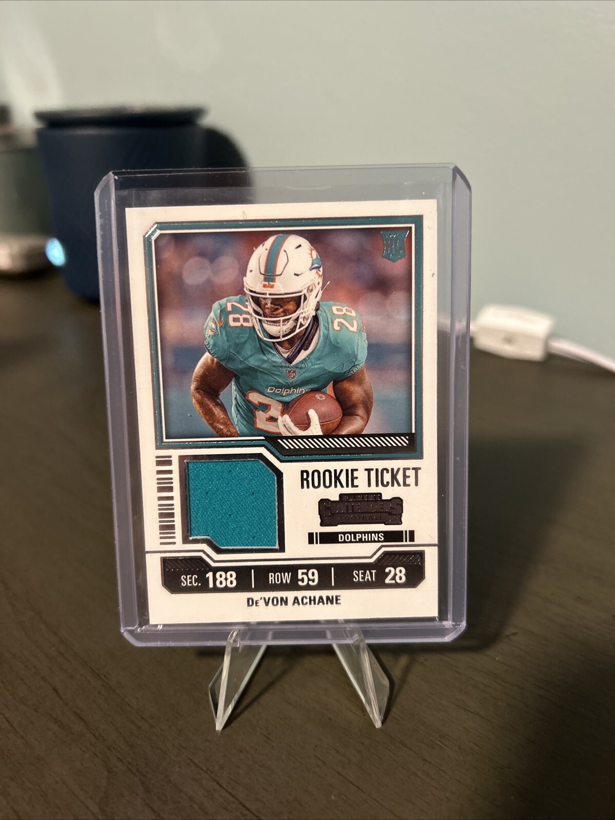 2023 Panini Contenders - Rookie Ticket Swatches #TS9 De'Von Achane (MEM, RC)