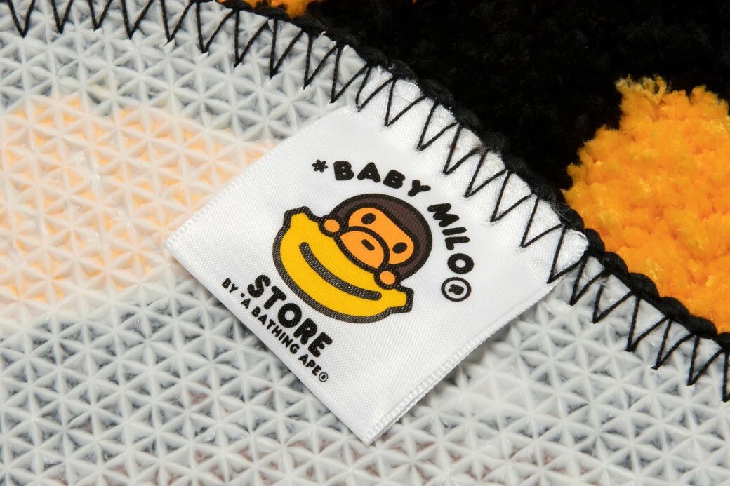 A BATHNIG APE BABY MILO STORE BABY MILO HAMBURGER RUG