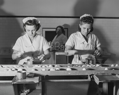 8x10 of two factory workers at an egg breaking plant in Chicago, IL.  (1941)