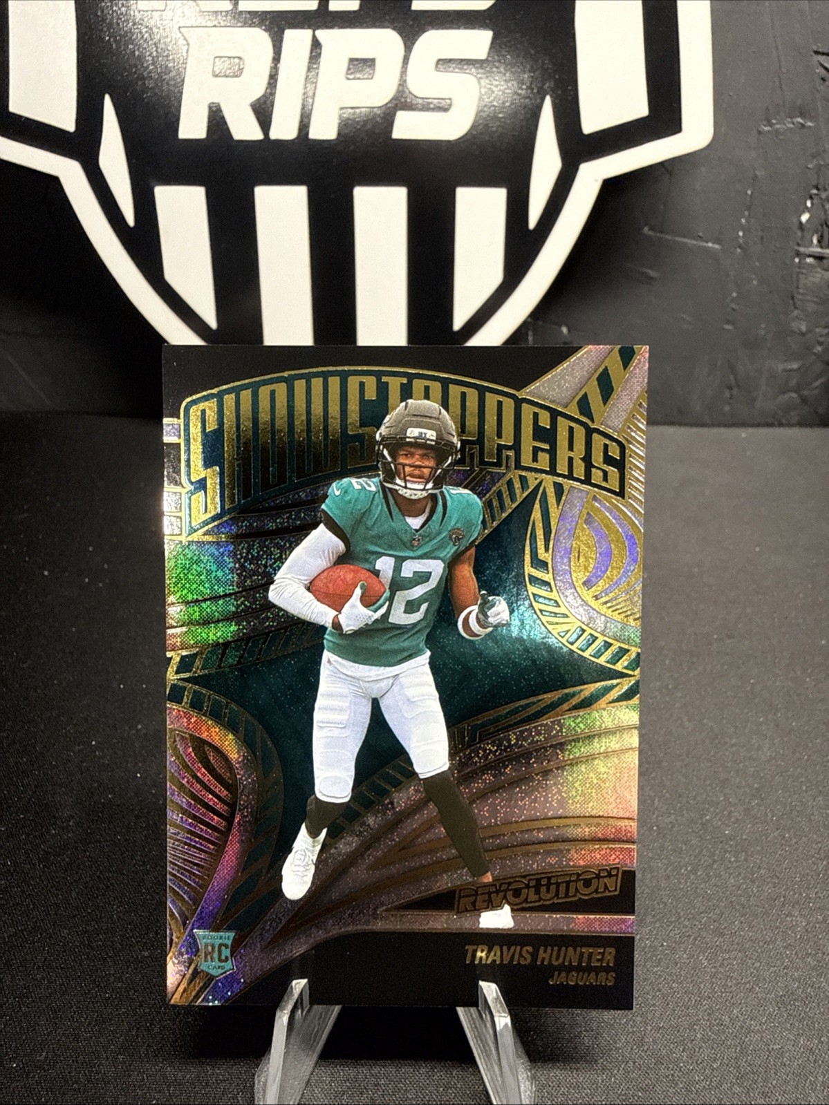 2025 Panini Revolution Showstoppers Travis Hunter #19 Neutron /30 Jaguars (RC)
