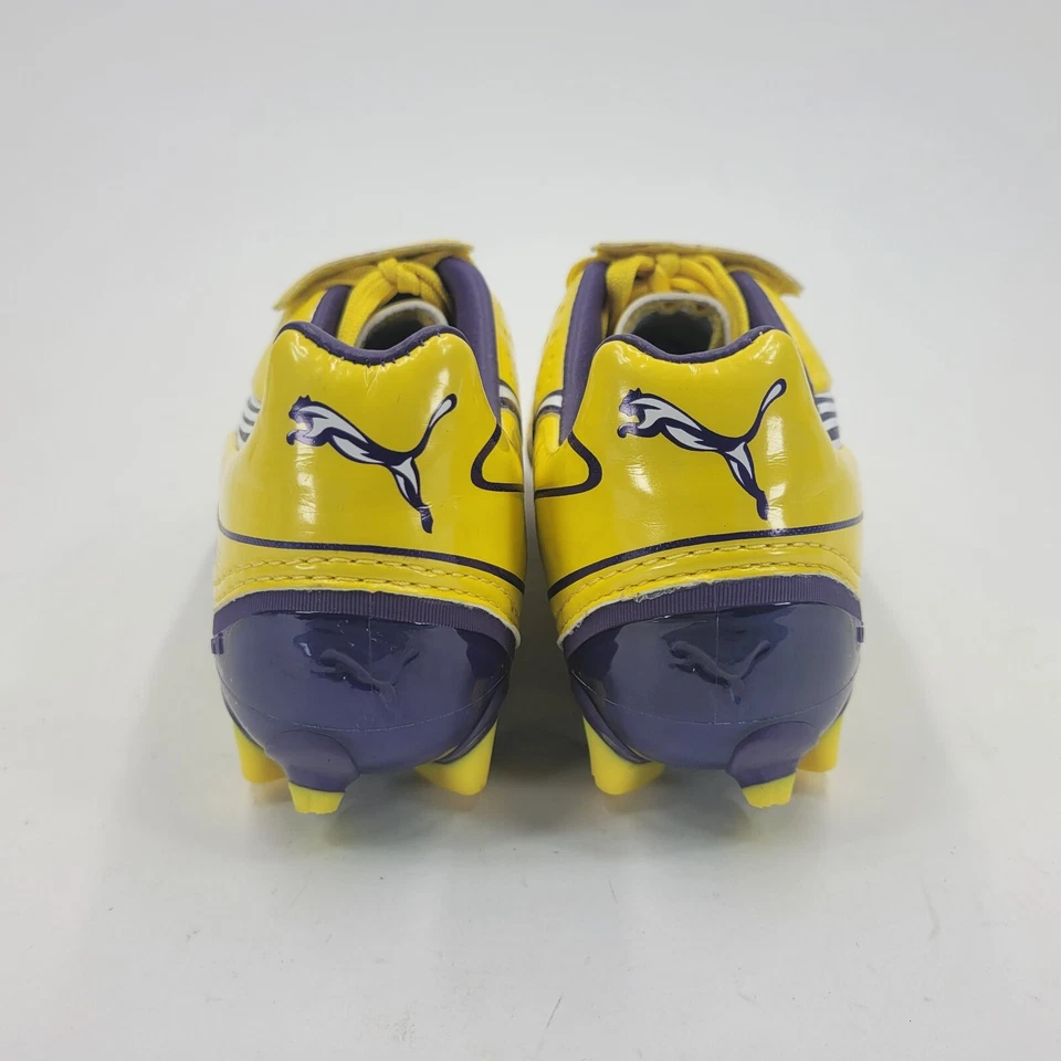 Botas de fútbol Puma V1.11 i FG Jr para niños terreno firme amarillo púrpura talla 4,5 impecables Foto 4 de 4