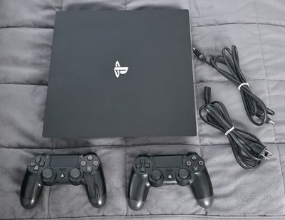 Sony PS4 Pro 1TB Console Black (CUH-7215B) Bundle - 2 Controllers & GTA V