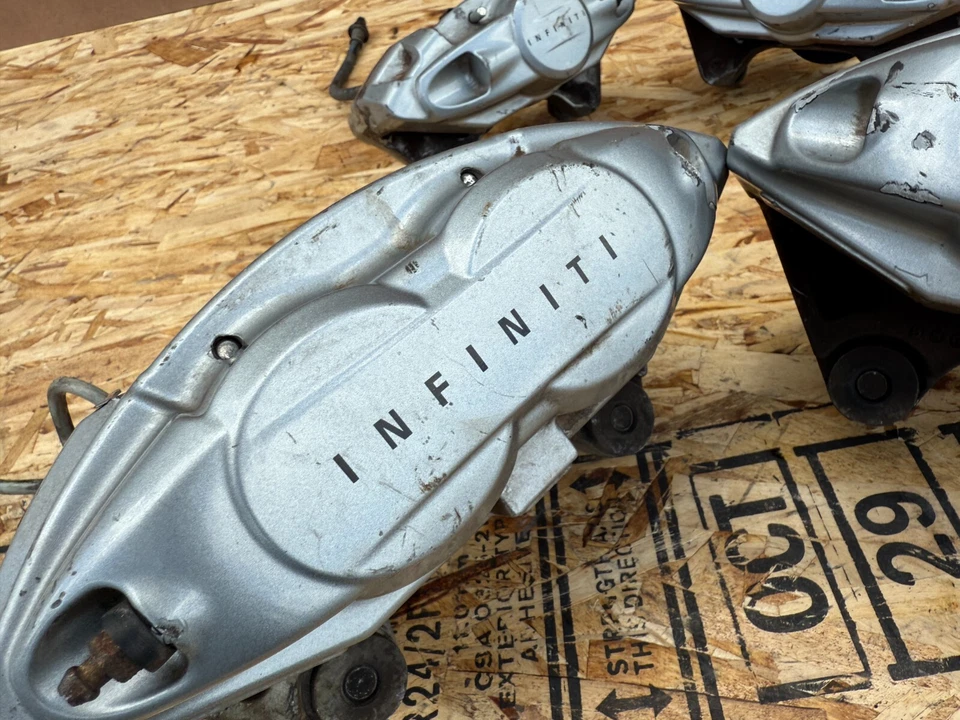 INFINITI NISSAN 2007-2024 OEM CONJUNTO DE PINZAS DE FRENO DELANTERAS TRASERAS IZQUIERDA DERECHA AKEBONO Foto 3 de 4
