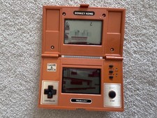 Thumbnail of ebay&reg; auction 188659574014 | Nintendo Vintage Game & Watch Donkey Kong DK-52 1982 Multi Screen Handheld 