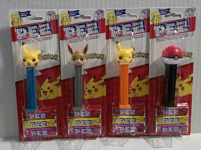 Lot of 4 PEZ Dispenser Pokémon Pikachu Laughing Eevee Poké Ball Pikachu Winking