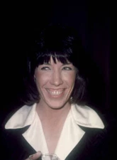comedian Lily Tomlin smiles at an unspecified event in New York ci- Old Photo