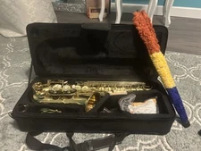 Student Model E-flat Saxophone With Neck Strap And Cleaning Supplies