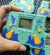 Tronica Alien Fighting Vintage 90's LCD Game Watch Handheld