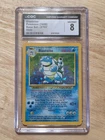 1999 pokemon Blastoise 002/102 Base Set Holo CGC 8