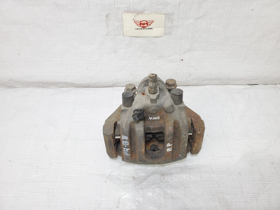 Pinza de freno trasera izquierda lado del conductor BMW 745i 745Li 2002-2005 OEM 34216753679 Foto 2 de 4