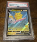 Pokémon Celebrations Surfing Pikachu V Full Art Holo #008/025 PSA 9 Card