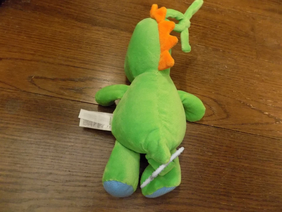 Juguete de cuna Carters Child Of Mine música musical peluche dinosaurio verde dragón Foto 3 de 4