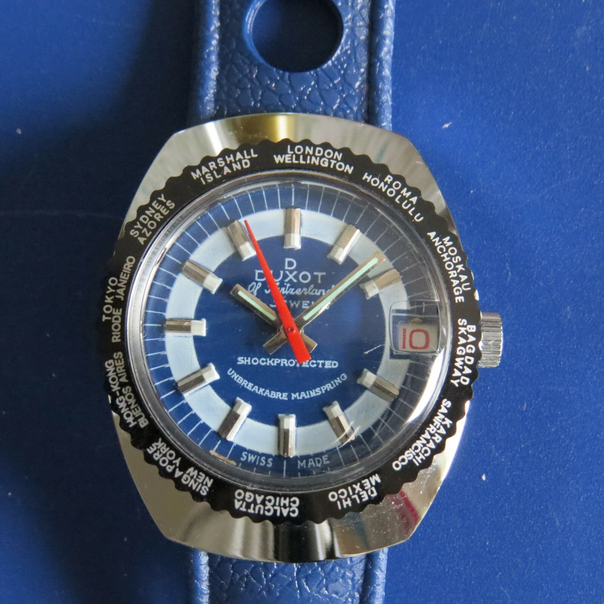 SWISS MADE NOS VINTAGE SIXTIES NEW DATE worldtime blue duxot watch