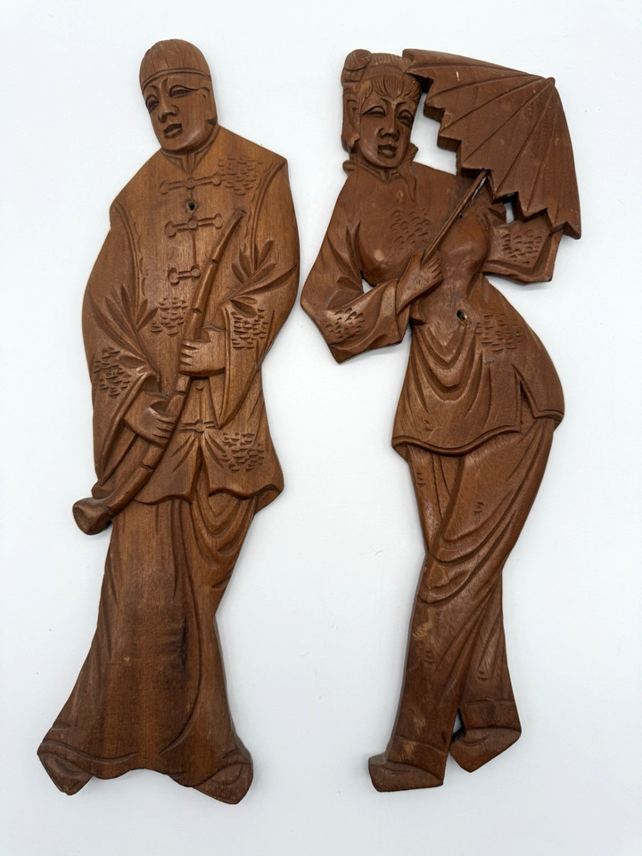 Hand-carved teak wood Asian-style art panels — real craftsmanship and material that makes a wall look like you traveled to get it.