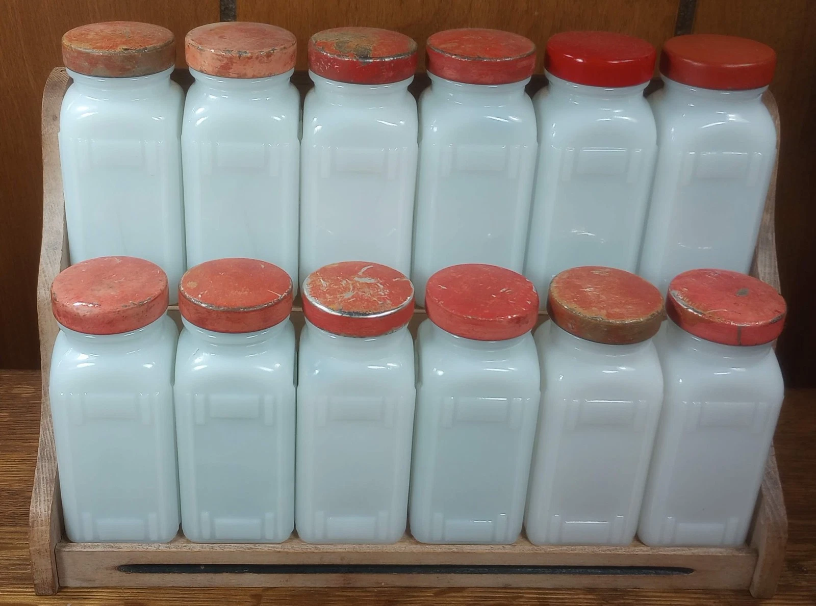 12 Vintage Milk Glass Spice Jars with Red Metal Lids and Wood Shelf Rack