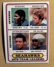 Click to enlarge Sherman Smith / Steve Largent / Dave Brown / Manu Tuiasosopo