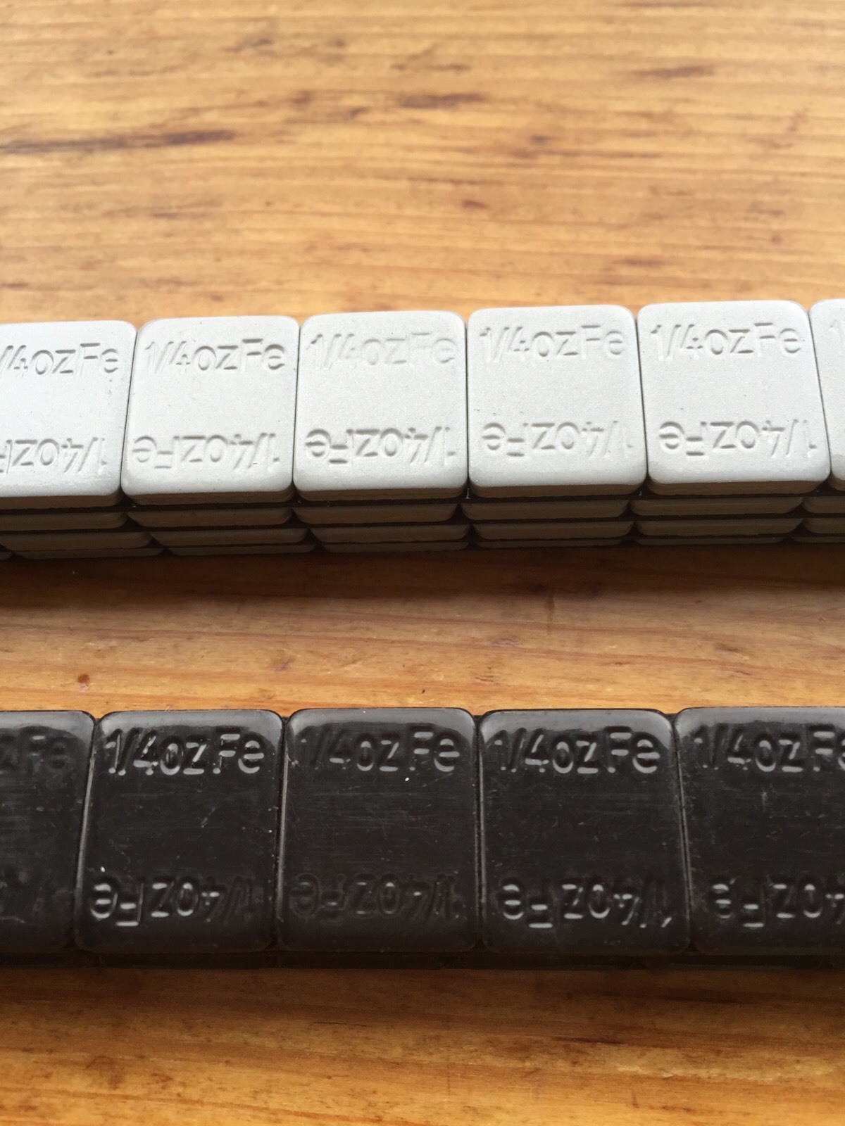 27 LBS BLACK WHEEL WEIGHTS1/4 OZ 27 LBS GREY 1/4 OZ. STICKON