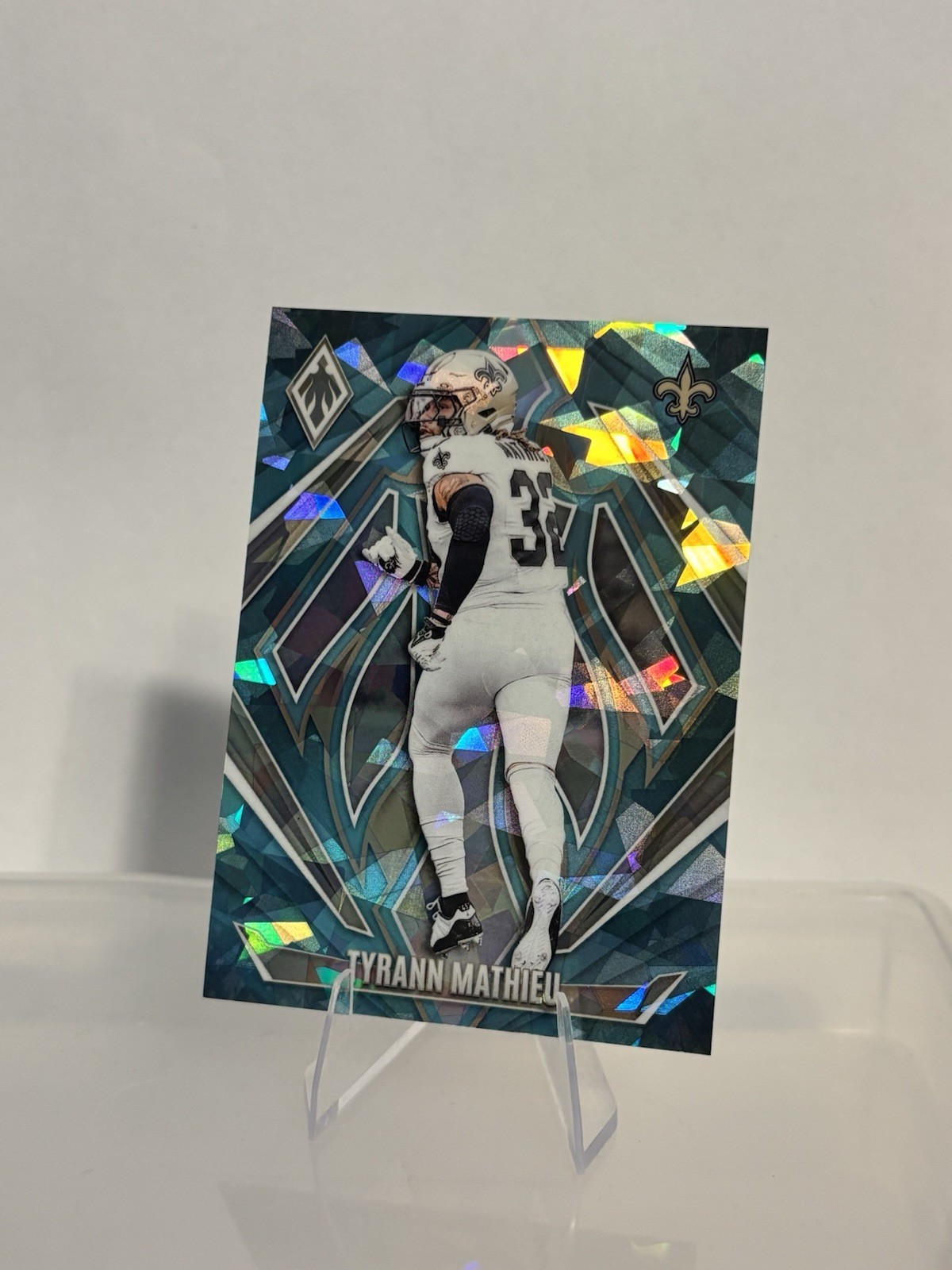 Tyrann Mathieu 2024 Panini Phoenix #143 Saints Teal Cracked Ice 5/7
