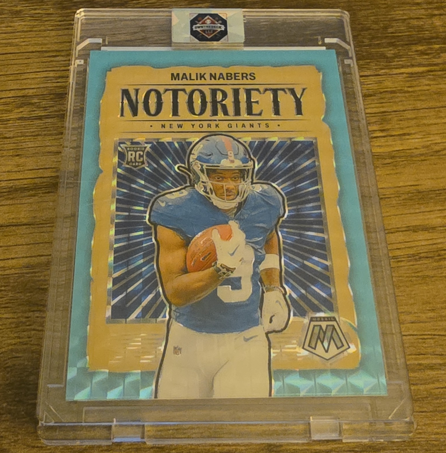 Panini 2024 Mosaic Malik Nabers Notoriety Blue Fluorescent Prizm /15 RC #23