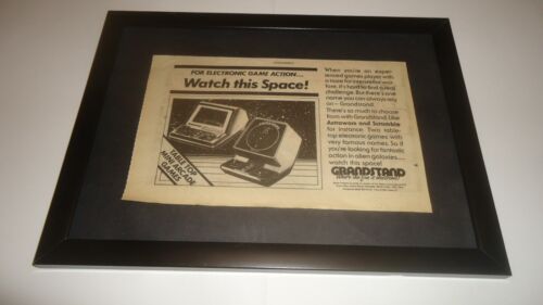 GRANDSTAND ASTROWARS & SCRAMBLE ARCADE GAMES-1983 framed original advert - Afbeelding 1 van 1