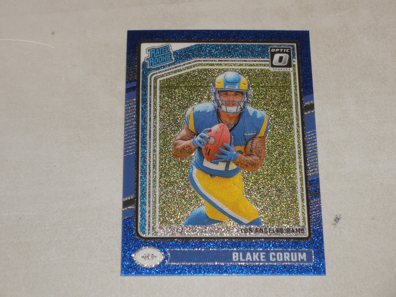 2024 Donruss Optic Rated Rookie Blue Glitter Prizm #208 Blake Corum RC
