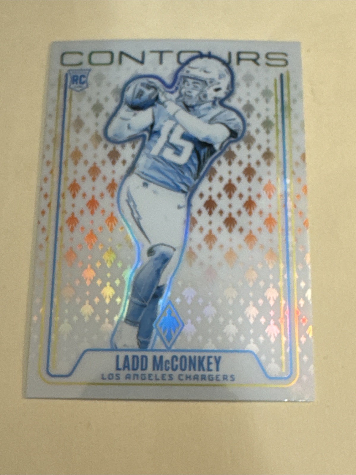 2024 Panini Phoenix - Contours Orange Ladd McConkey #CON-LMY Chargers RC