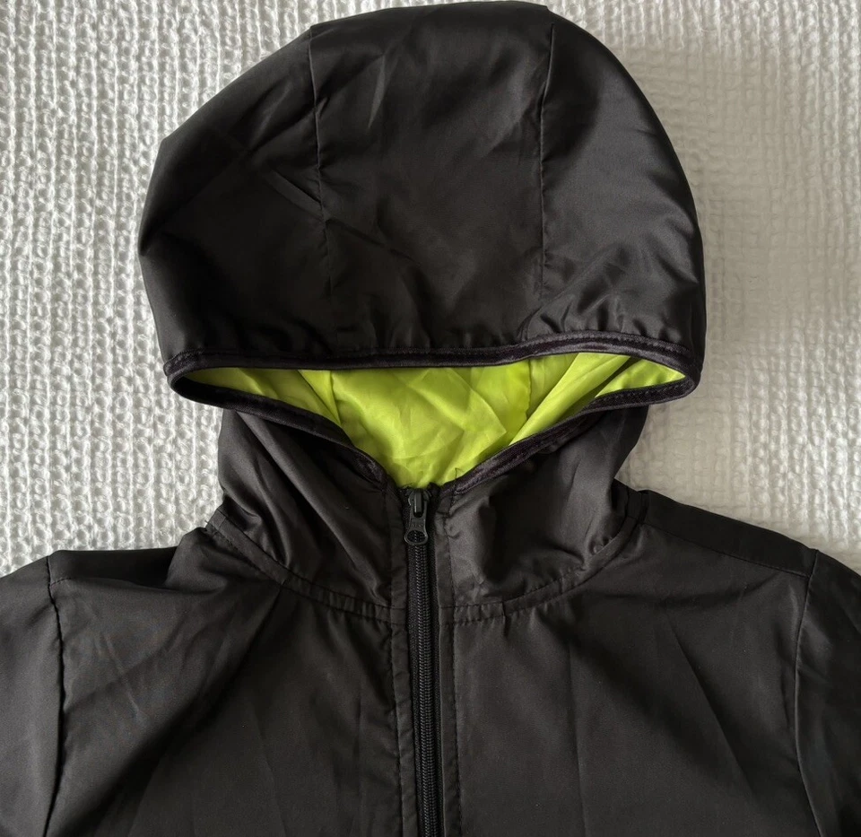 Chaqueta cortavientos mediana Joe Boxer para niños jóvenes negra neón cremallera completa sudadera con capucha usada en excelente estado M Foto 2 de 4