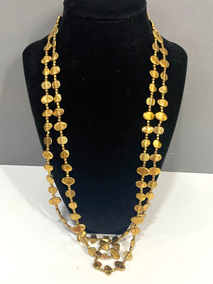 Gold tone 48'' long mixed texture beaded necklace