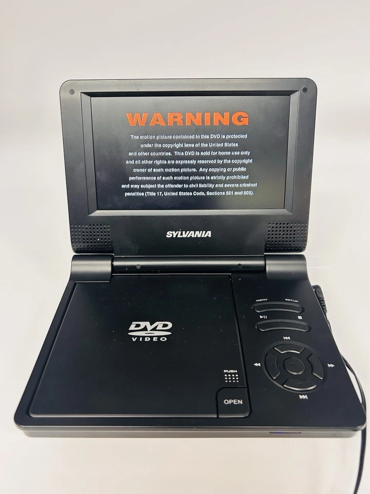 Sylvania SDVD7014 Negro 7" Pantalla LCD Portátil Reproductor de DVD Control Remoto Adaptador de CA FUNCIONA Foto 3 de 4