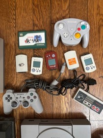 Lot of game consoles controllers VMU Zelda Game Watch NES Atari Playstation JUNK