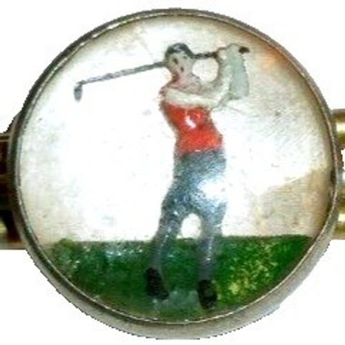 A signed Swank golfer tie clip with a geometric diamond cutout — tiny, gold-toned, mid-century cool that says 'I dress with intention' without saying a word.