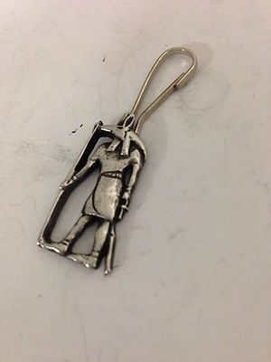 Anubis R201 englisches Zinn Emblem auf einem Reißverschluss Abzieher