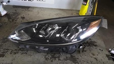 Used Left Headlight Assembly fits: 2020 Ford Escape halogen w/projector LED sign