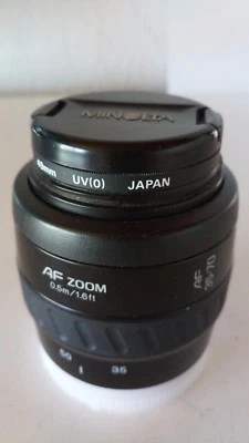 Objectif Minolta (Sony) AF 35X70 3.5(22) 4.5 en tres bon etat avec bouchons - Photo 1/4