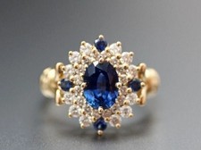 2 Ct Oval Cut Lab-Created Blue Sapphire Halo Wedding Ring 14k Yellow Gold Plated