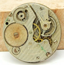Antique 1894 Ingersoll Reliance 7 jewel 14 size open face pocket watch movement