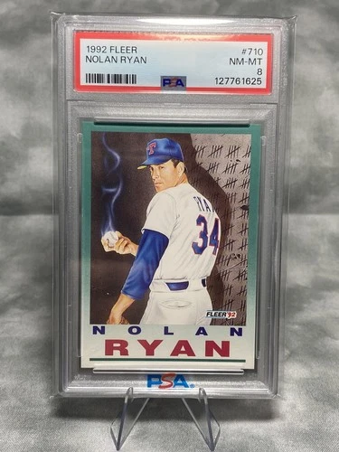 NOLAN RYAN (HOLDING SMOKING BASEBALL) 1992 FLEER PSA-8 NM-MT CARD#710 (NEW SLAB)
