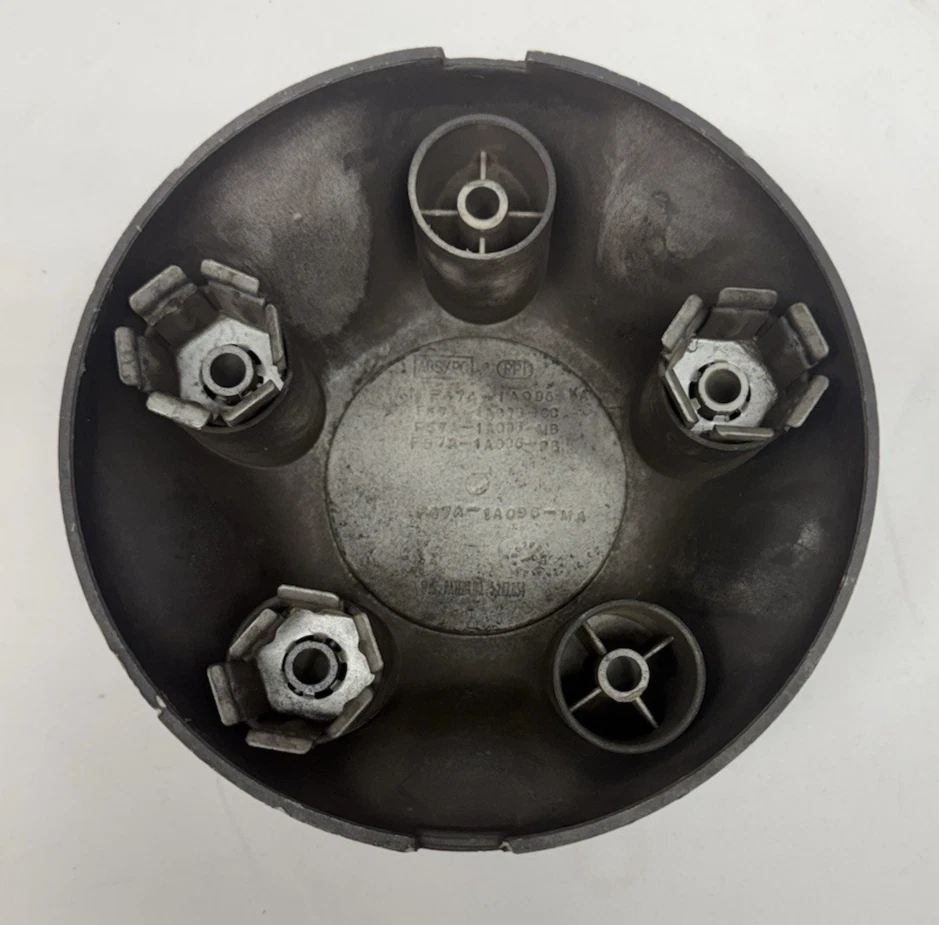 Tapacubos central de rueda para camioneta Mazda B 1998-2003 original de fábrica negro Foto 4 de 4