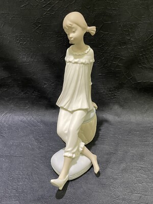 Lladro 1084 Girl with Mother's Shoe Sitting on Ottoman