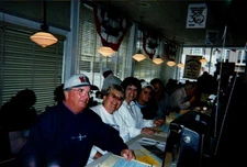 Vintage Found Photograph  Diner Gathering Friends Smiling at Countertop Scene