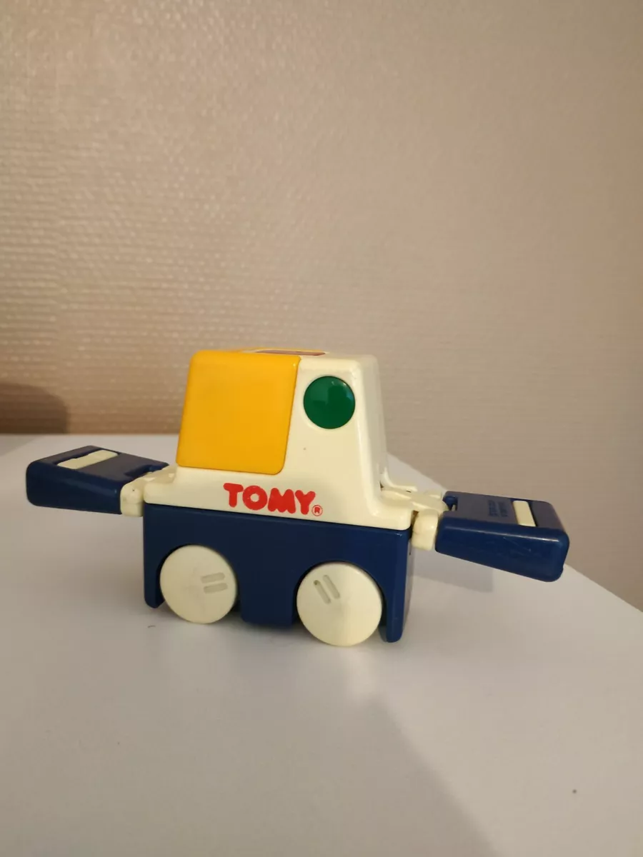 Jouet tomy trotteur sale