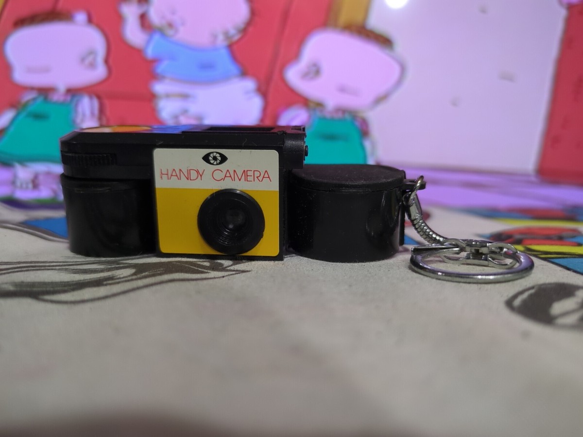 Vintage Micro 110 Film Camera Coin Box Case Plastic Keychain Toy