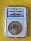 1923 S $1 United States Silver Peace Dollar Blue NGC "Almost Uncirculated"
