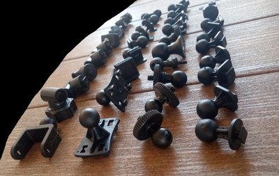A Multitude Of Joints, Elbows, Suction Cups, And Other Accessories For Dash Cams